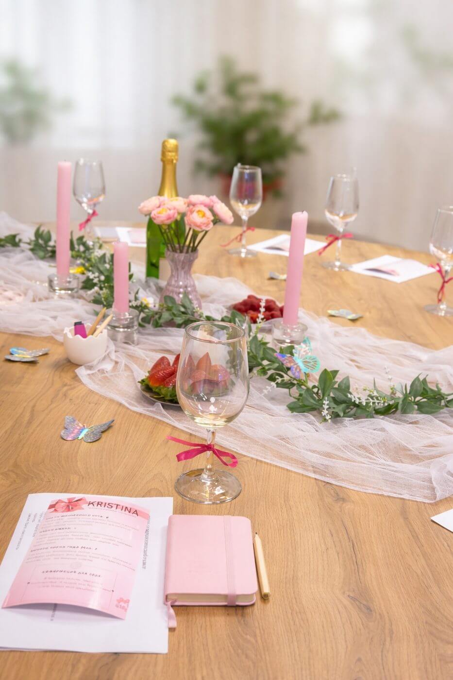 Pink table setup with champagne