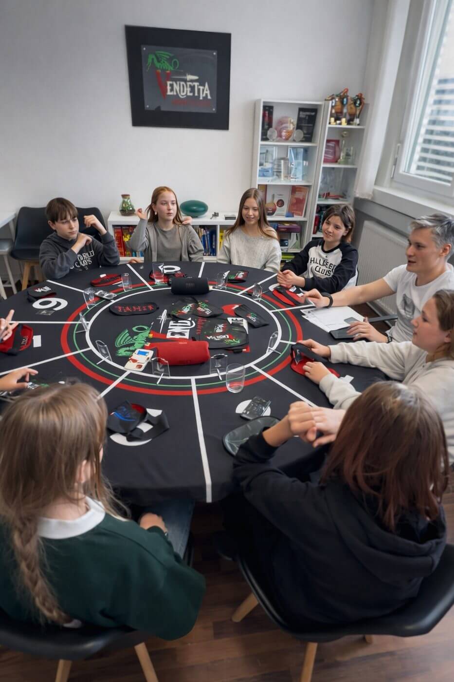 Teens at Vendetta mafia table